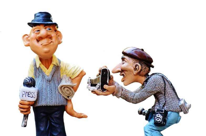 a couple of figurines standing next to each other, by Jim Nelson, pixabay contest winner, photorealism, pointing at the camera, el chavo, kodachrome camera, while smiling for a photograph