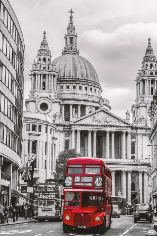 a red double decker bus driving down a city street, inspired by Christopher Wren, 4k vertical wallpaper, cathedrals, red monochrome, vintage - w 1 0 2 4