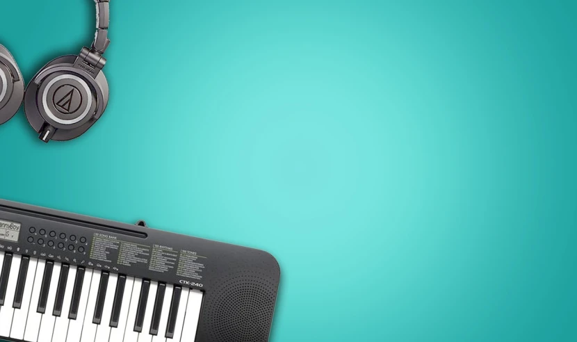 a keyboard and headphones on a blue background, an album cover, minimalism, canon photo, toys, banner, mid shot photo