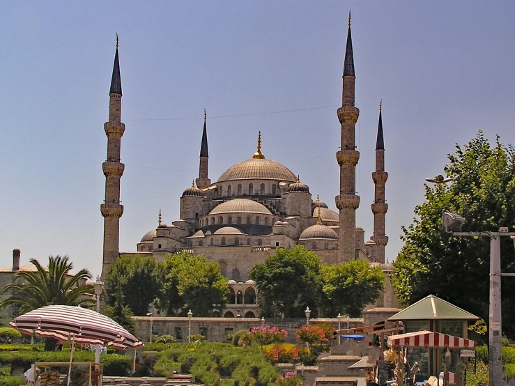 a large building sitting in the middle of a park, by Tom Carapic, flickr, hurufiyya, with great domes and arches, minarets, blue, proper shading