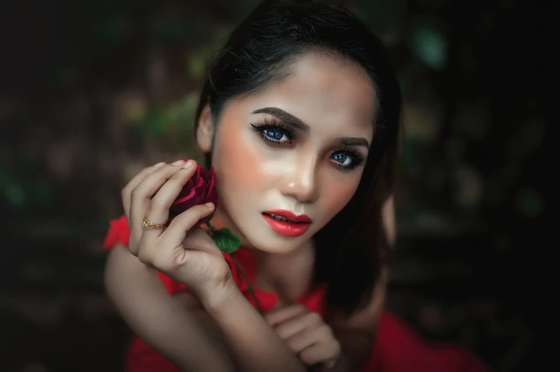 a woman in a red dress posing for a picture, by Galen Dara, pexels contest winner, detailed face of a asian girl, red rose, wlop hdr, a portrait of a blue eye girl