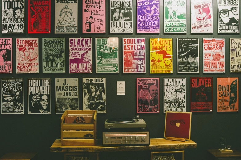 a bunch of posters that are on a wall, poster art, by Tom Palin, unsplash, black arts movement, concert poster retro, wood block print, in the magic room, vintage - w 1 0 2 4