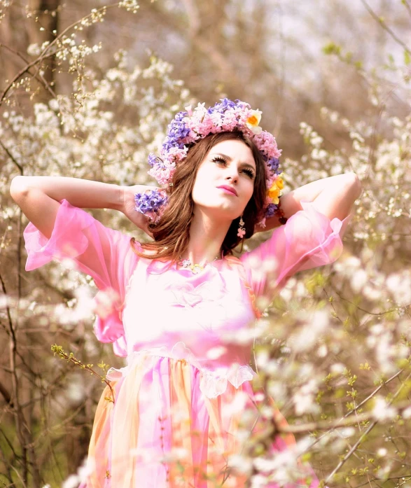 a woman in a pink dress posing for a picture, a portrait, inspired by Oleg Oprisco, flickr, romanticism, 1 9 8 0 s flower power hippy, 🌸 🌼 💮, brunette fairy woman, spring theme