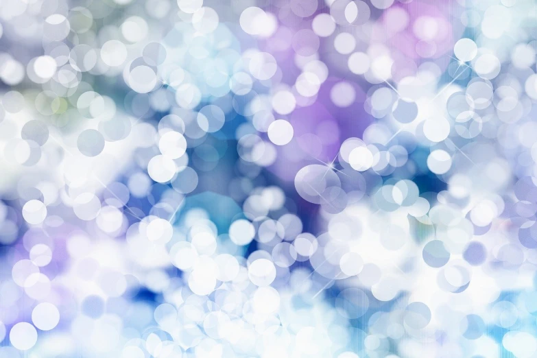a close up of a blurry blue and purple background, shutterstock, light and space, white sparkles everywhere, holiday season, jasmine, bokeh photo