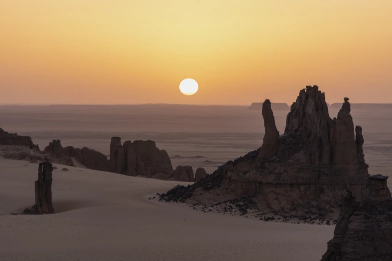 the sun is setting over the desert landscape, by Etienne Delessert, pexels contest winner, romanticism, rock formations, egyptian landscape, white desert, fine details