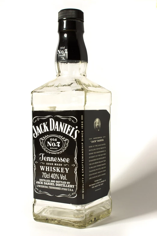 a bottle of jack daniels whiskey on a white surface, inspired by Jack Smith, flickr, c 4 d ”, black and white”, front side view full sheet, full head shot