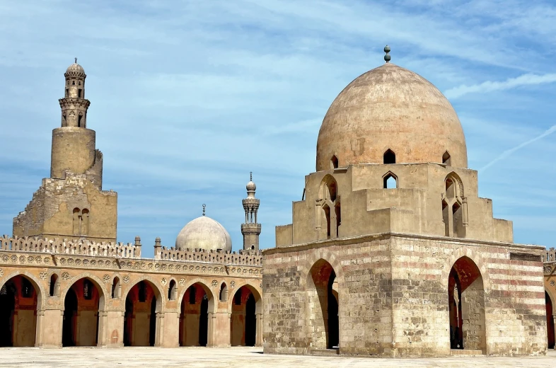 a large building with a dome on top of it, a photo, by Youssef Howayek, shutterstock, arabesque, tombs, well contoured smooth fair walls, -640, domes