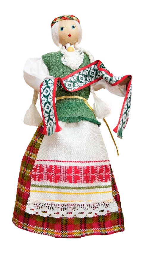 a close up of a doll on a black background, inspired by Sándor Bortnyik, shutterstock, folk art, dressed a long white, green, detailed scan”, document photo