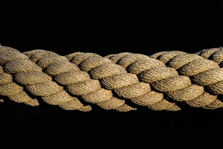 a close up of a rope on a black background, a macro photograph, renaissance, highly detailed product photo, high detail product photo, stacked, 1128x191 resolution