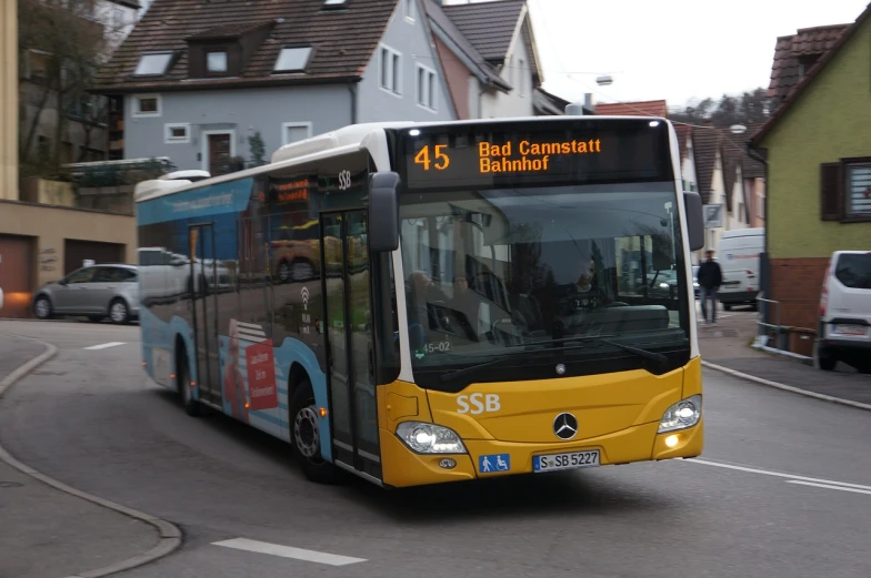 a bus that is driving down a street, by Karl Stauffer-Bern, flickr, sun coast, mercedes, 1 5 0 4, contourless