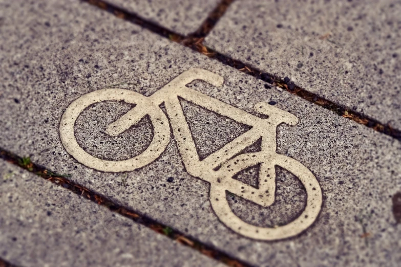 a stencil of a bicycle on a sidewalk, by Kurt Roesch, trending on pixabay, tilt shift”, pictogram, symmetrical detail, hd footage