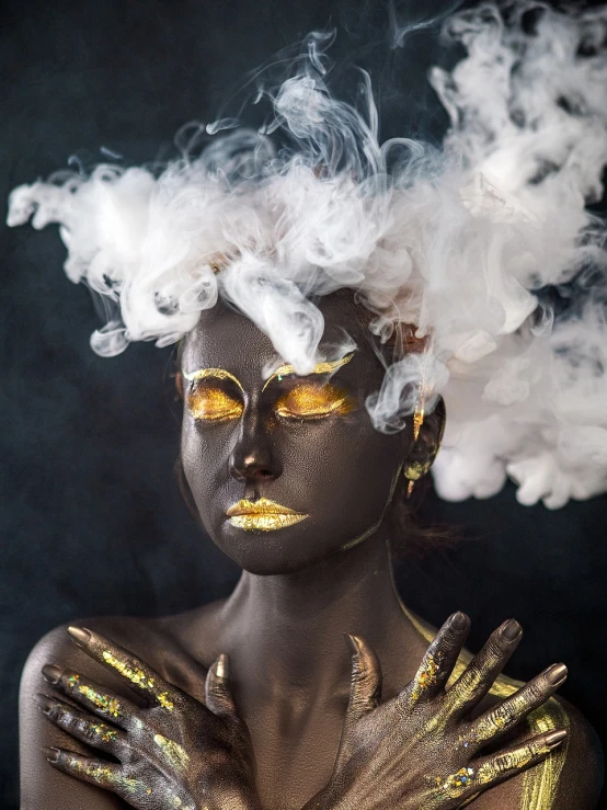 a woman with gold paint and smoke on her face, an airbrush painting, inspired by Hedi Xandt, trending on cg society, afrofuturism, hair made of shimmering ghosts, ooak, dramatic smoking pose, sculpture made of gold