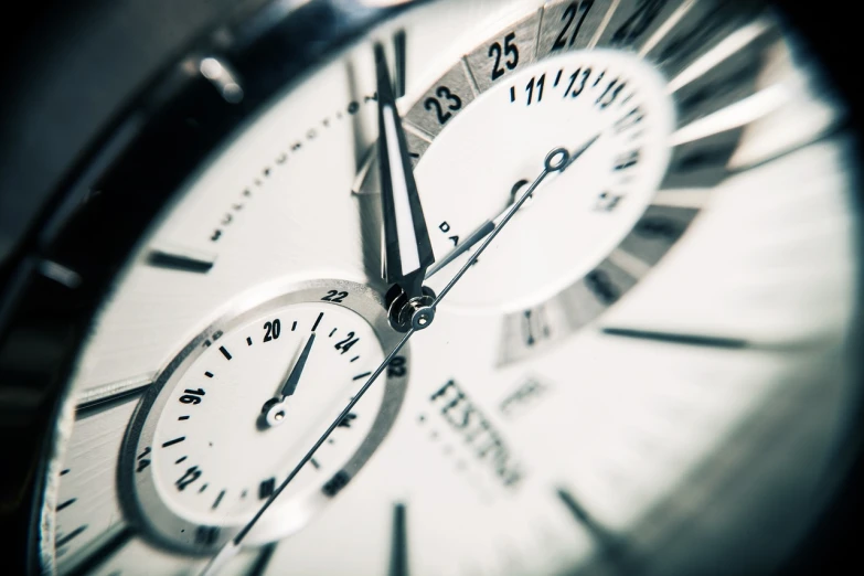 a close up of a clock with roman numerals, a photo, by Matija Jama, shutterstock, bauhaus, very shallow depth of field, watch photo, super detailed picture, document photo