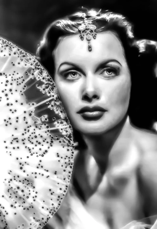 a black and white photo of a woman holding a fan, inspired by George Hurrell, digital art, barclay shaw 8 k photorealistic, jeweled veil, angeline jolie, closeup view