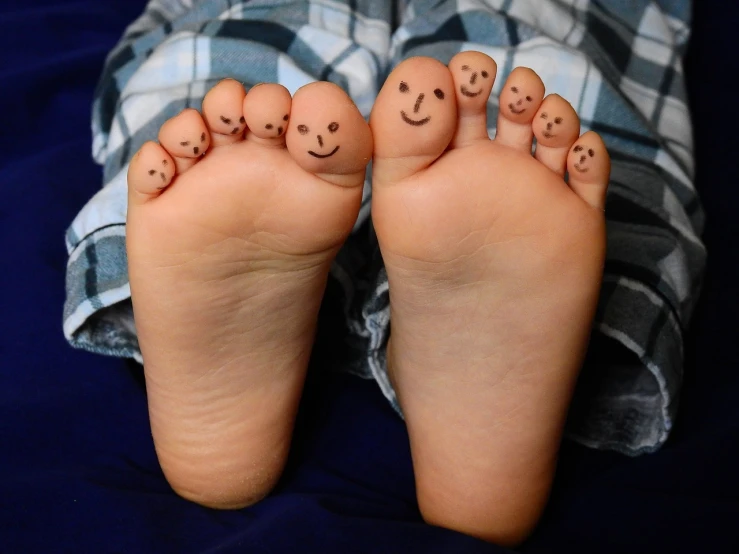 a pair of feet with smiley faces drawn on them, pexels, sculpted, small man, with fully detailed faces, bob