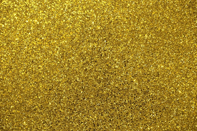 a close up of a gold glitter background, pointillism, yellow glowing background, metallic polished surfaces, golden jewelry, very detailed background