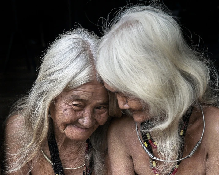 a couple of older women sitting next to each other, tumblr, sumatraism, amazonian, spirit hugs, hair, lpoty