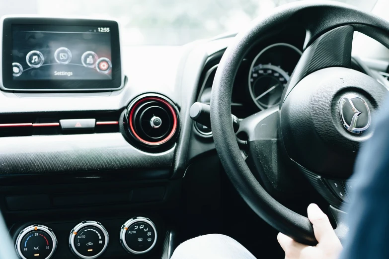 a close up of a person driving a car, purism, red and black details, inside view, product introduction photo, detailed wide shot