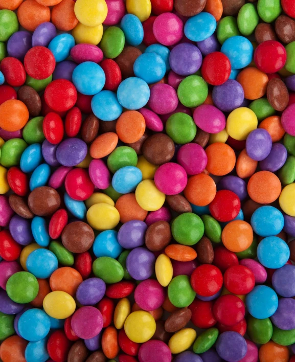 a pile of multicolored candy sitting on top of a table, color field, colorful ben day dots, chocolate, high detail product photo, full of colour 8-w 1024