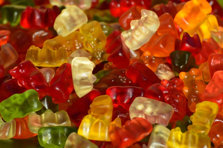 a pile of gummy bears sitting on top of each other, a picture, by Eugeniusz Zak, pexels, 1024x1024, jelly - like texture. photograph, hills, italian