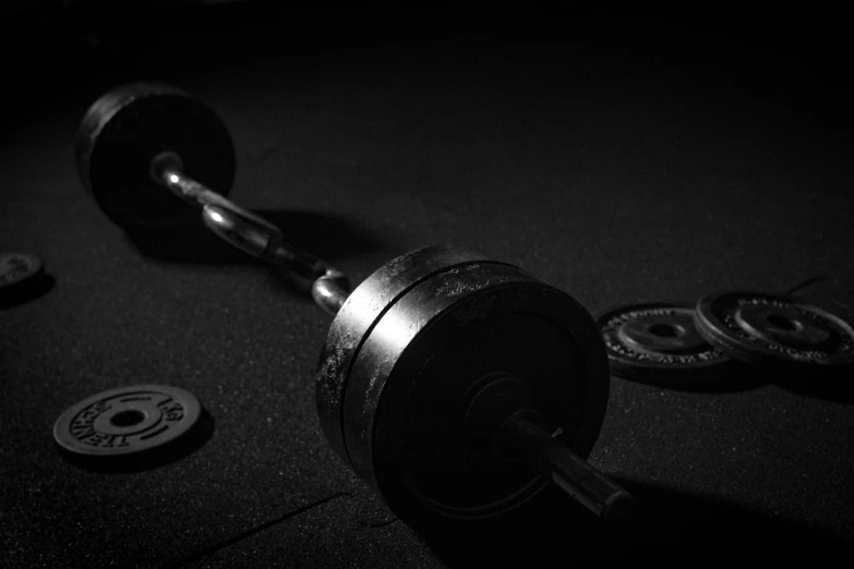 a black and white photo of a barbell, pexels contest winner, dau-al-set, wallpaper mobile, dark warm light, fanart, 4 0 9 6