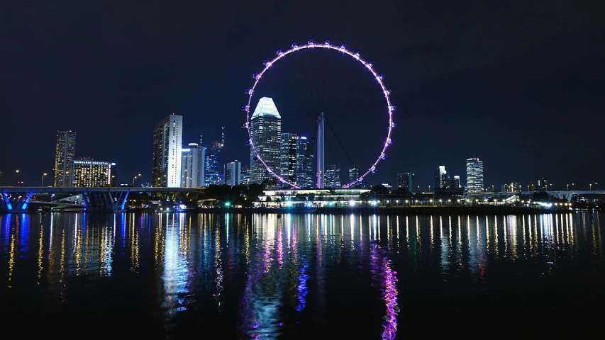 a large ferris wheel sitting in the middle of a body of water, a picture, by Patrick Ching, hurufiyya, the singapore skyline, afp, beautiful wallpaper, usa-sep 20