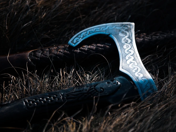 a close up of a knife on the ground, concept art, by Ásgrímur Jónsson, unsplash, hurufiyya, celtic norse frankish, blue and ice silver color armor, detailed product photo, shepherd's crook