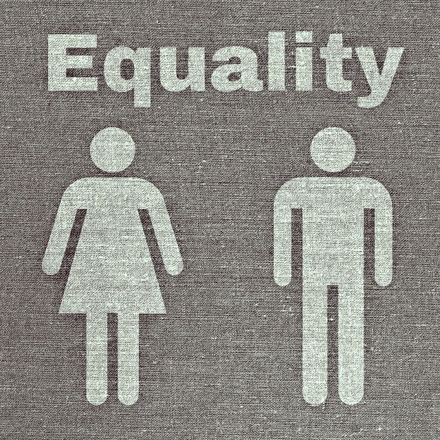 a couple of men and women standing next to each other, by Arabella Rankin, pixabay, feminist art, grey cloth, the toilet is shiny, in white lettering, hemp