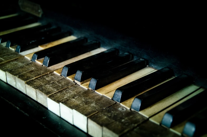 a close up of the keys of a piano, a macro photograph, pexels, baroque, deteriorated, vignetting, discovered photo, vinyl