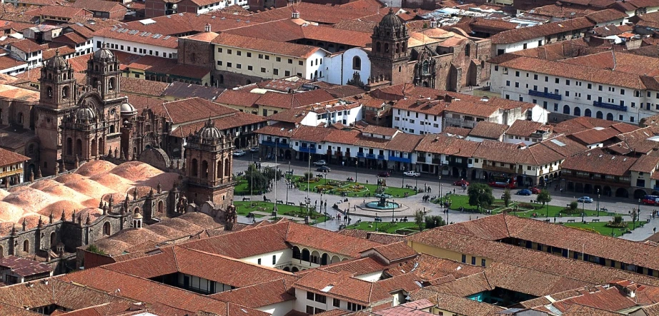 an aerial view of a city with a clock tower, a photo, by Dietmar Damerau, quito school, machu picchu, fountains and arches, high details!, white buildings with red roofs