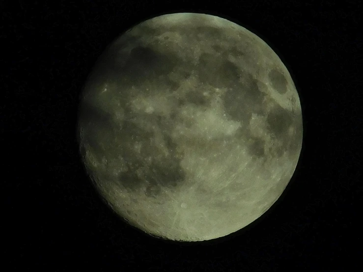 a plane flying in front of a full moon, a picture, by Joe Stefanelli, flickr, sōsaku hanga, close-up!!!!!!, moon craters, greenish tinge, round-cropped