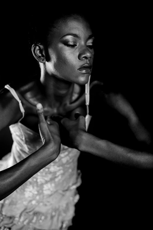 a black and white photo of a woman in a dress, by Thomas Fogarty, art photography, dramatic lighting hyper detail, adut akech, fashion week backstage, dynamic dance photography