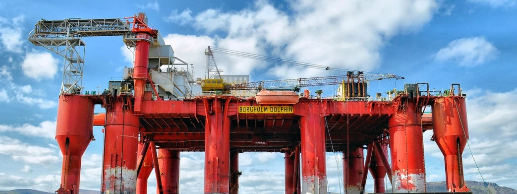 an oil rig in the middle of a body of water, a photo, by Edwin Georgi, flickr, graffiti, perspective from below, sitting in a crane, australian, high details!