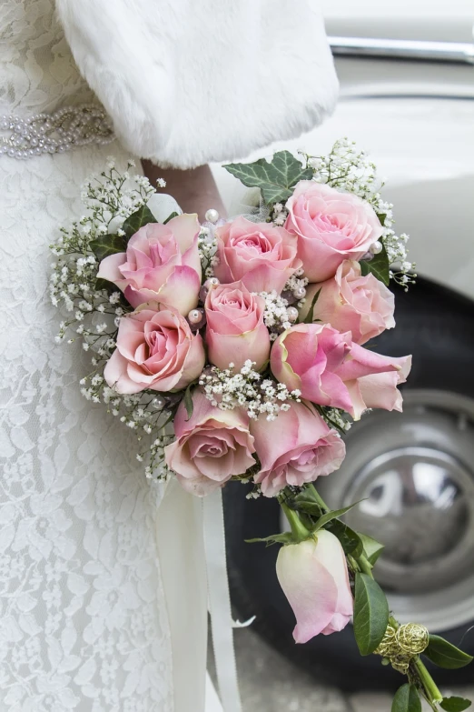 a bride holding a bouquet of pink roses, romanticism, car shot, hyperdetailed!!, lowres, f/11