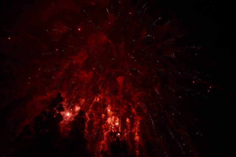 a red fireworks is lit up in the night sky, a picture, by Erwin Bowien, 4k!, usa-sep 20, red magic, grand finale