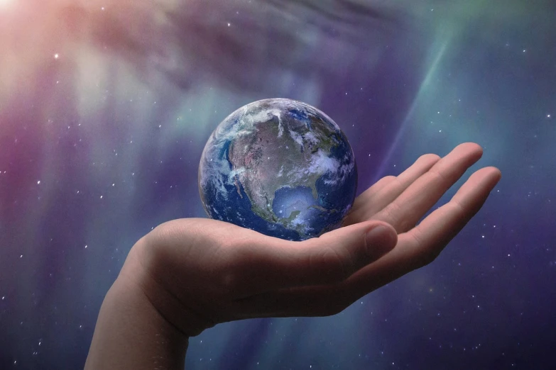a person holding a small earth in their hand, by Kurt Roesch, naturalism, gaia human and digital, having a time of our un-life, taken in 2 0 2 0, spiritual science