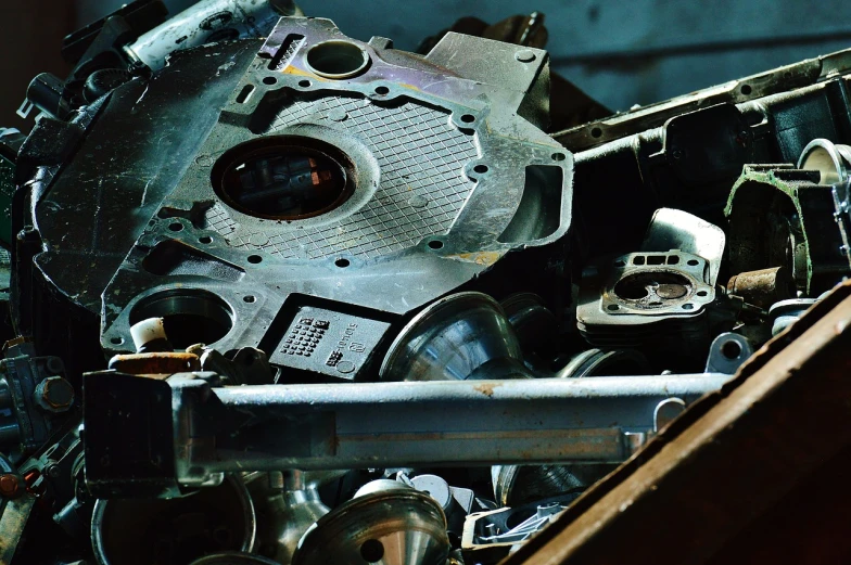a close up of a machine on a table, unsplash, assemblage, closeup of car engine, photo of poor condition, cut-away, set pieces