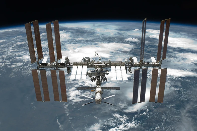 a satellite view of the international space station, a portrait, shutterstock, establishing shot, ; wide shot, family photo, full image