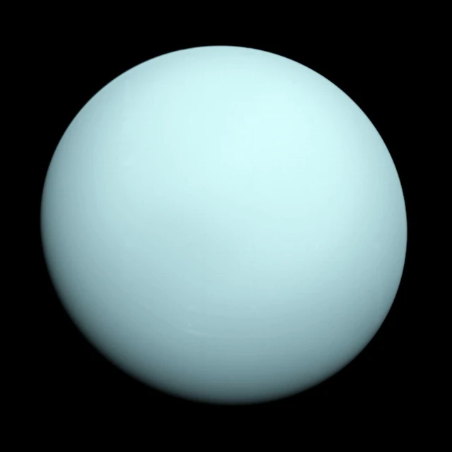a close up of a white ball on a black background, by Alexander Scott, planet uranus, cyan atmosphere, the surface of the sun, mint