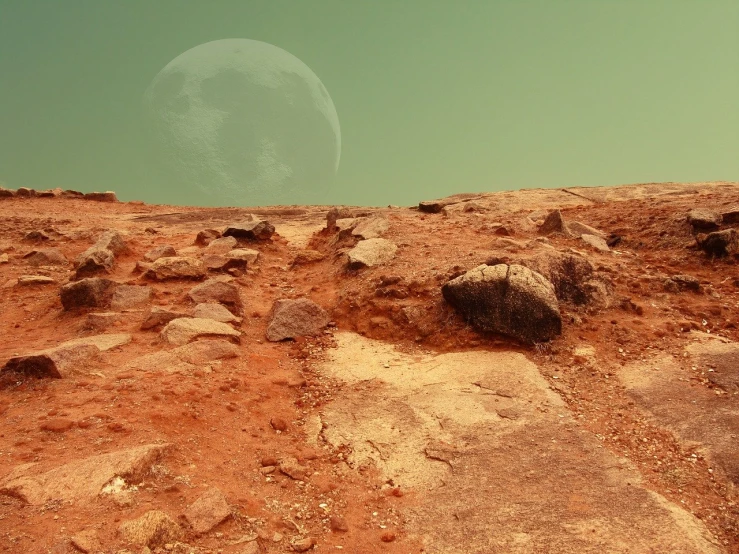 a rocky hill with a full moon in the background, a detailed matte painting, shutterstock, romanticism, on the orange surface of mars, moonwalker photo, very accurate photo, lunch time on jupiter