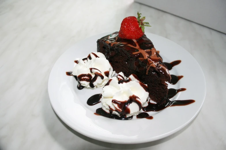 a piece of chocolate cake with whipped cream and a strawberry, by Robbie Trevino, flickr, dada, chocolate sauce, ( ready - made ), hair, cascade