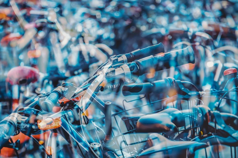 a bunch of bikes parked next to each other, by Matija Jama, panfuturism, bokeh. chrome accents, blue tinted, 🤬 🤮 💕 🎀, from yowamushi pedal