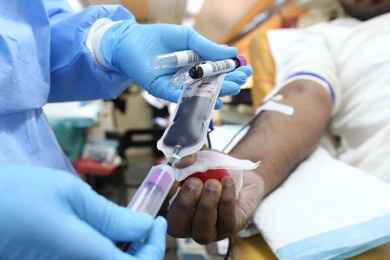 a close up of a person in a hospital bed, a photo, spraying blood, india, closeup photo, surgical iv bag