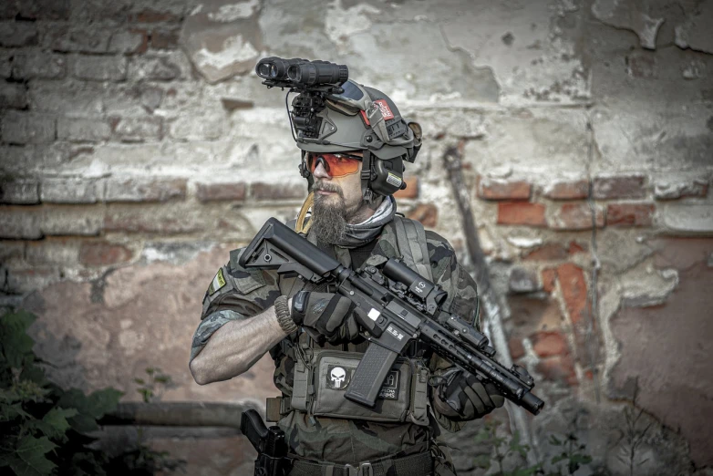 a man with a gun standing in front of a brick wall, a portrait, inspired by Carl Gustaf Pilo, shutterstock, skull helmet, resting after a hard mission, multicam, detailed picture