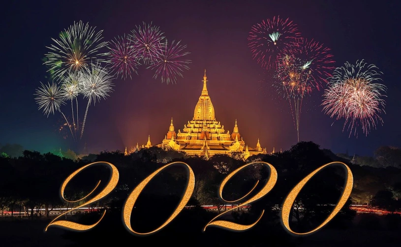 fireworks in the sky with a building in the background, a picture, by Nancy Carline, pixabay, art deco, myanmar, 2 0 2 0 s promotional art, buddhist, golden number