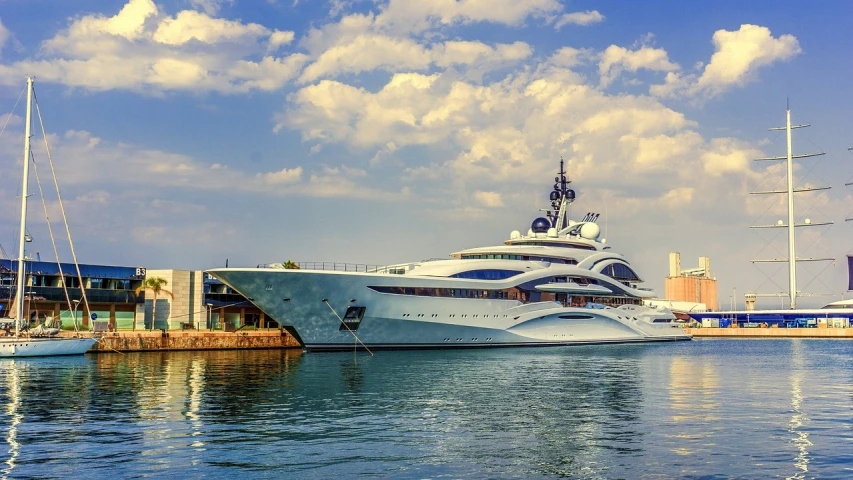 a large white boat sitting on top of a body of water, pixabay, hypermodernism, extremely opulent, bulgari, wallpaper mobile, docked at harbor