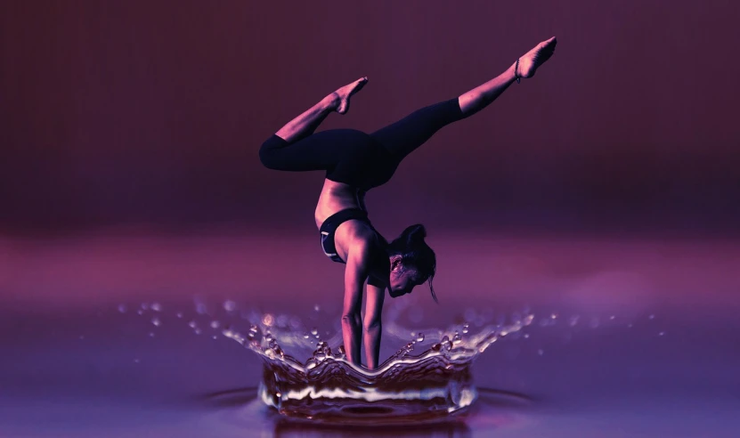 a woman doing a handstand in the water, a digital rendering, arabesque, purple liquid, promotional photography, water droplet, drake