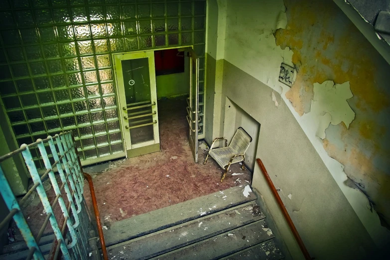 a set of stairs leading up to a green door, by Stefan Gierowski, flickr, happening, in a decayed hospital room, old chairs, [ overhead view ]!!, cinematic view from lower angle