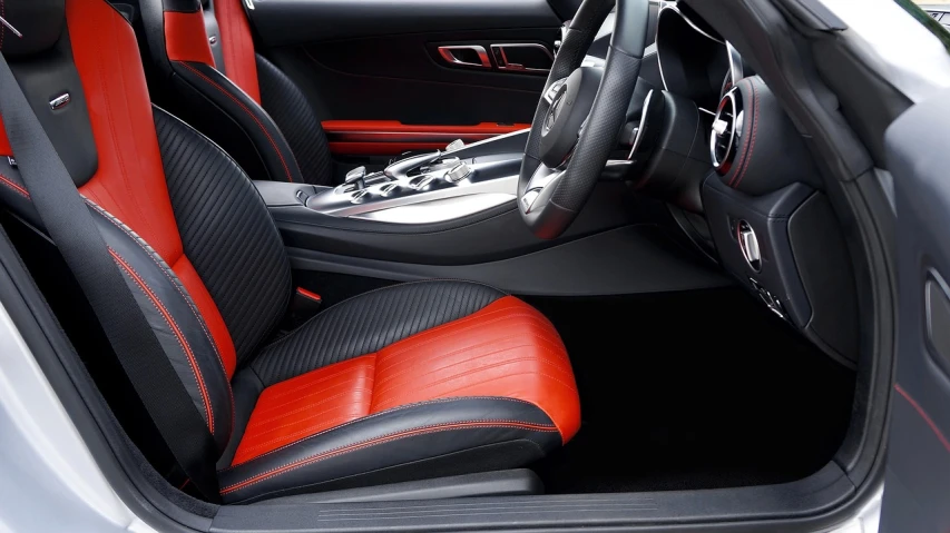 the interior of a red and black sports car, clean and pristine design, redering, full res, super detailing