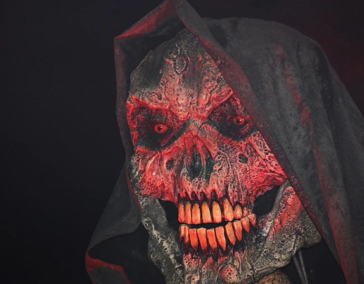 a close up of a person wearing a mask, a portrait, evil death, detailed glowing red implants, closeup photo, grim reaper